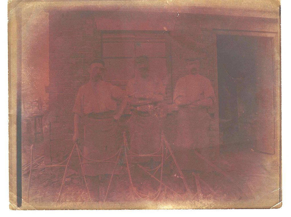 ThreeMenwithFarmingTools-1024x764