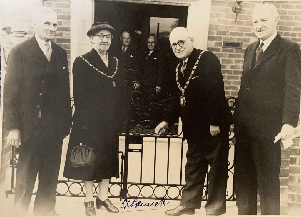 #2: Opening of the Club gate in Moorgate 13th April 1957. Left to right... Mr. John Prescott, Chairman of the Ormskirk Welfare Committee Mrs. Bennett Mr. Fitch and Mr. Les Sharp (background) Mr. Bennett, Chairman of Ormskirk Urban District Council Mr. John Barton, Hon. Secretary Old People’s Club